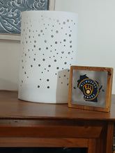Wood, Metal, and Fabric Milwaukee Brewers baseball sign on a beautiful cabinet.